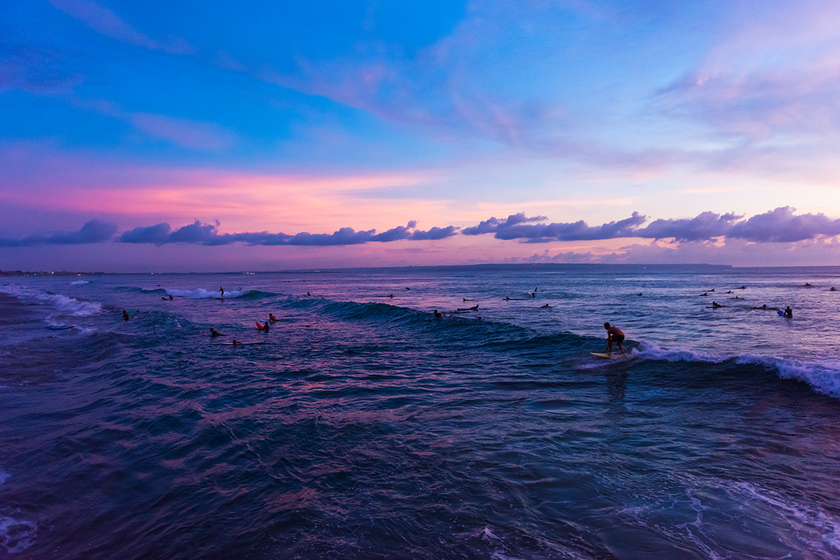 scenic view of the waves and cliffs at Batu Bolong Beach