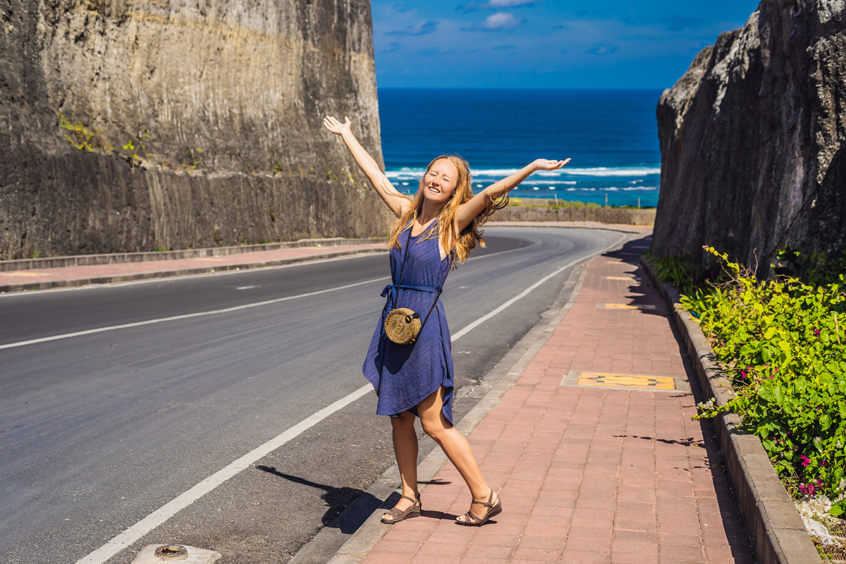 a girl near the road to Pandawa Beach