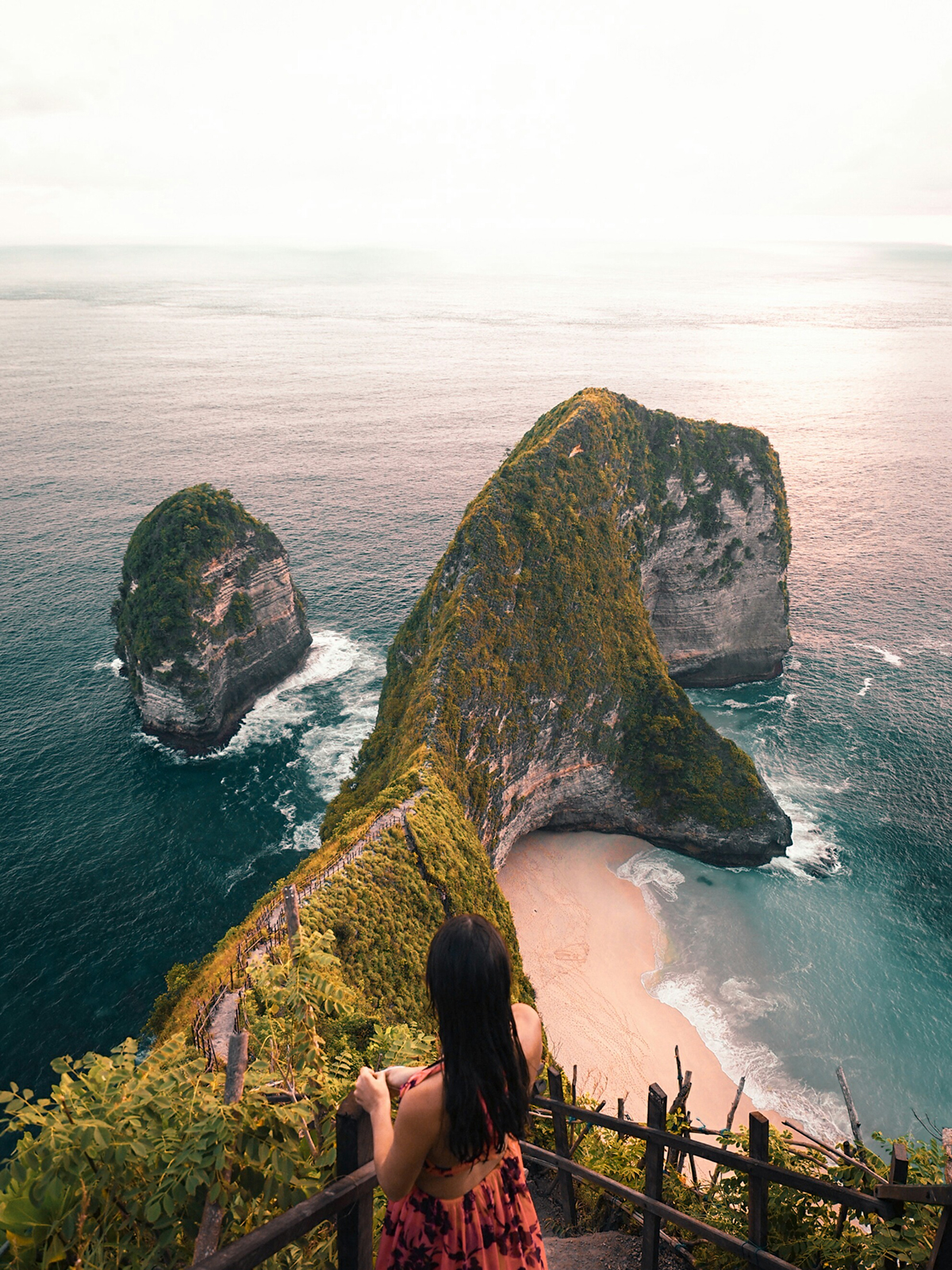 a tourist at Kelingking Beach, Nusa Penida, Bali