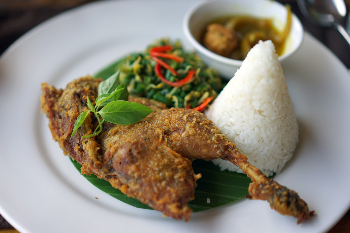 a plate of a crispy fried duck