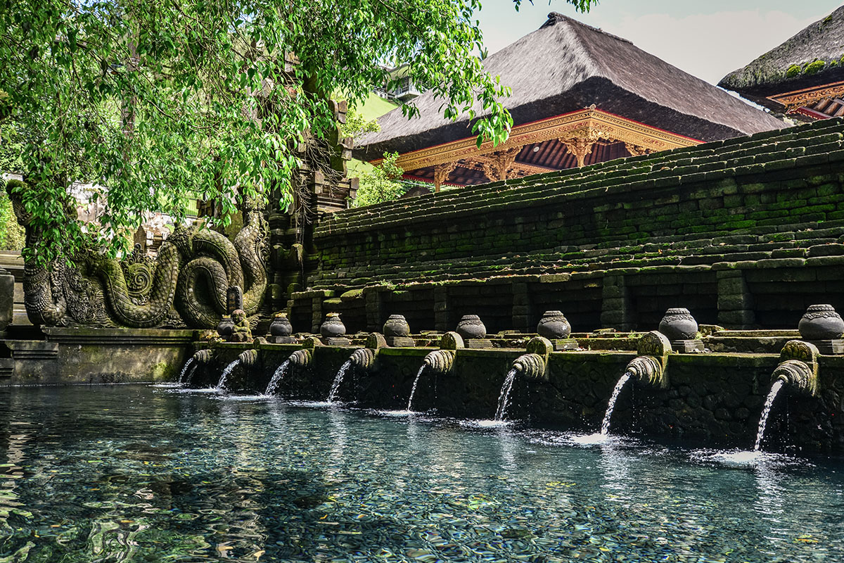 a row of waterspouts in Tirta Empul