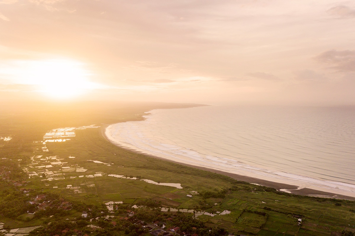 aerial sunset view of Palapang beach at Ciletuh Geopark, West Java