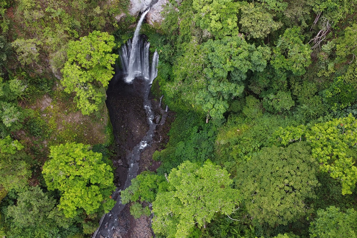 aerial shot of waterfall at Rinjani Geopark Lombok West Nusa Tenggara
