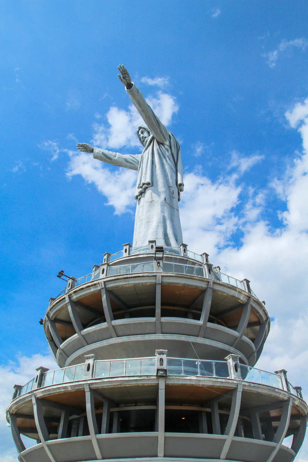 low angle shot from side of Jesus Statue Buntu Burake