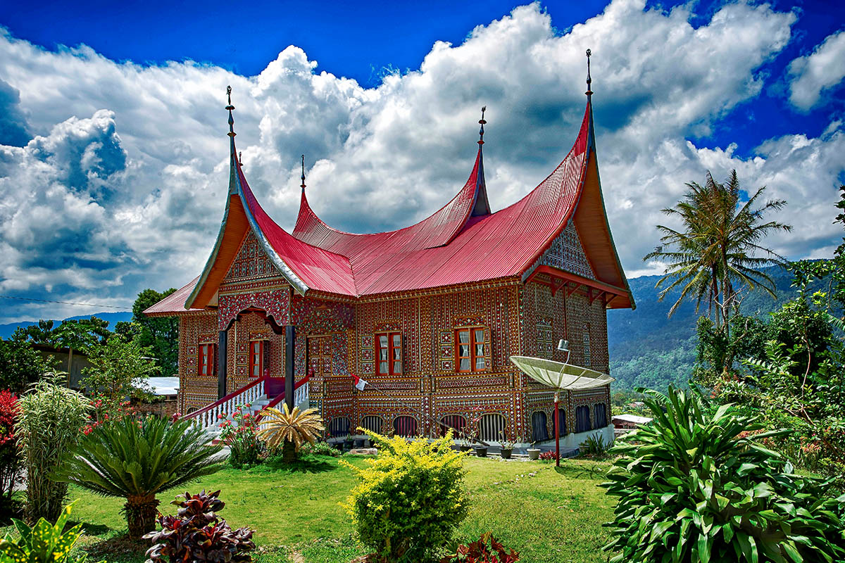 a Gadang house with red roof