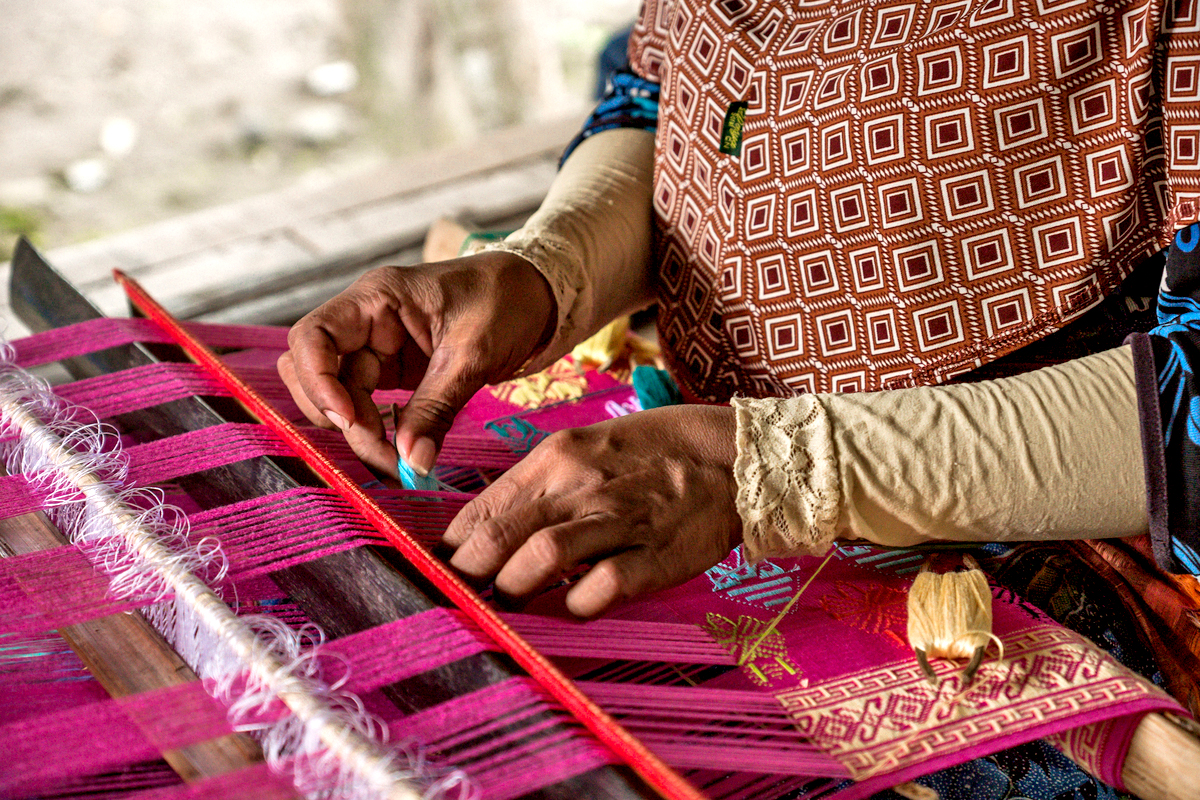 local Lombok people doing tenun