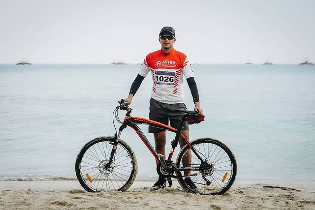 a biker in Tanjung Lesung beach