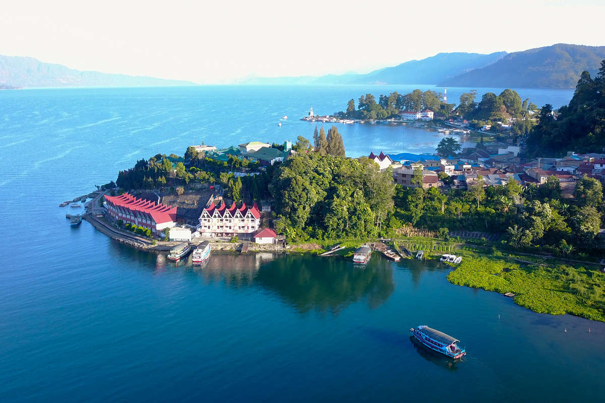 a view of Samosir Island in the middle of Lake Toba