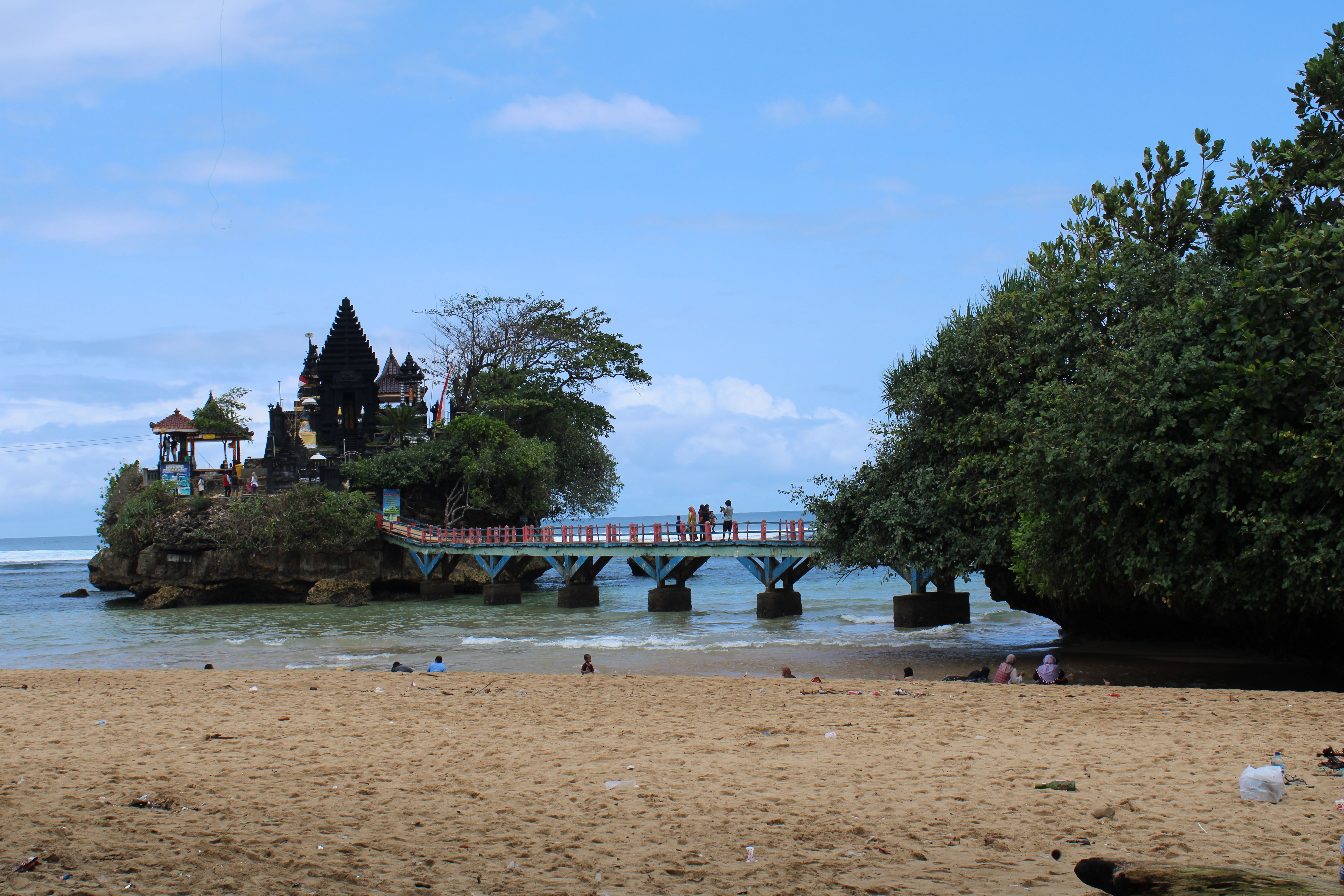 Balekambang Beach: An Iconic Beach with a Temple on a Rocky Islet