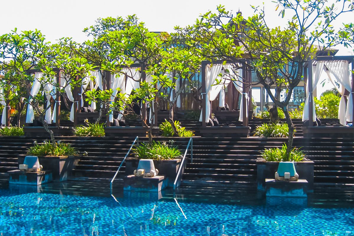 view of crystal blue pool at St. Regis Resort
