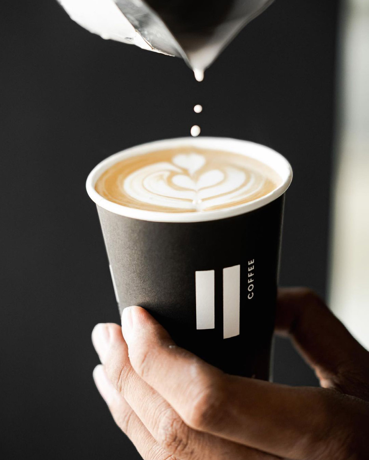 Kopi Latte dalam cup dari After Friday Coffee